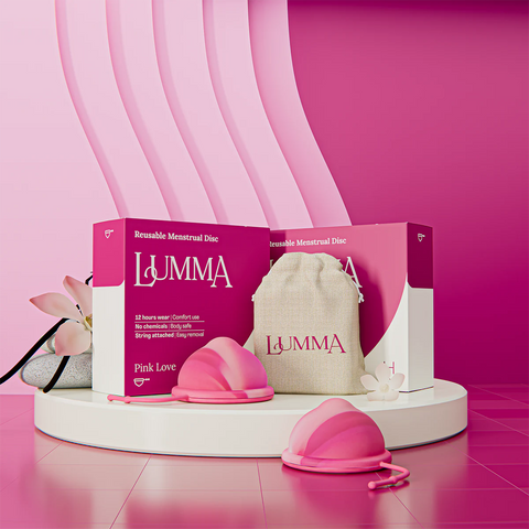 Lumma reusable menstrual disc in the pink love color with packaging and pouch